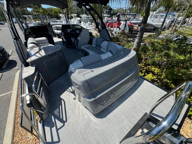 Slide: The Image of 2025 Avalon Excalibur 27' boat interior with sleek seating and modern design. - 11