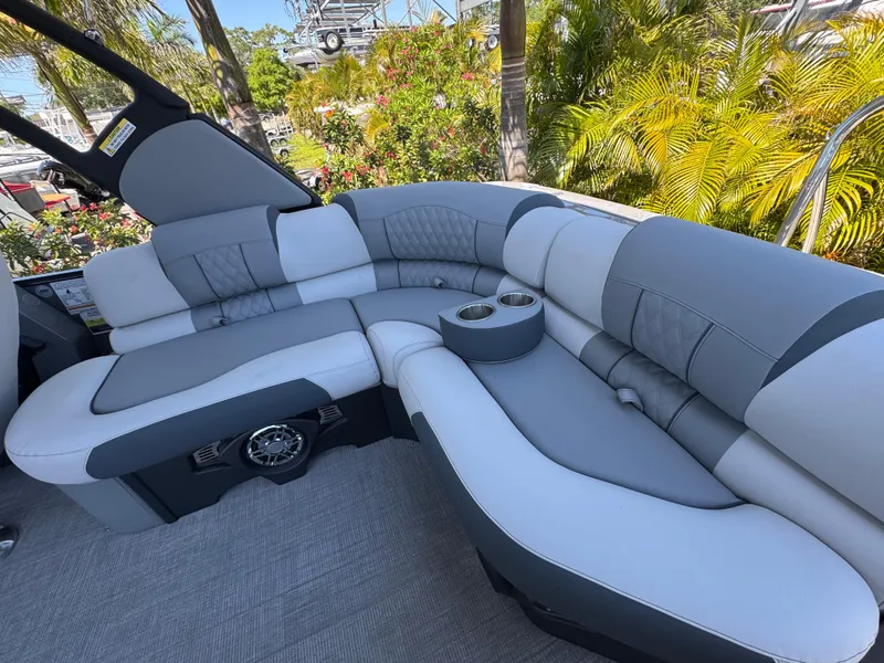 Slide: The Image of Luxurious seating on 2025 Avalon Excalibur 27' boat, featuring plush gray upholstery. - 20