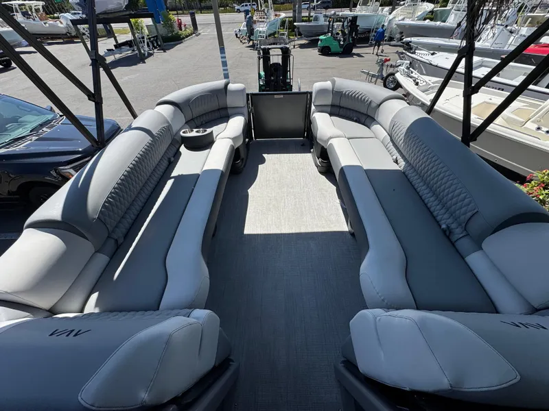 Slide: The Image of Luxurious 2025 Avalon Excalibur 27' pontoon boat with spacious seating and modern design. - 29