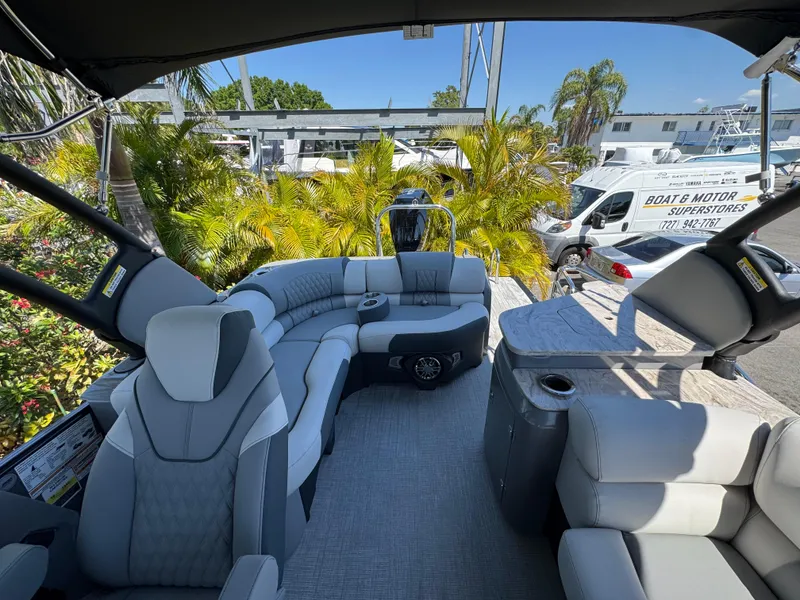 Slide: The Image of Luxurious 2025 Avalon Excalibur 27' boat interior with plush seating and modern design. - 38