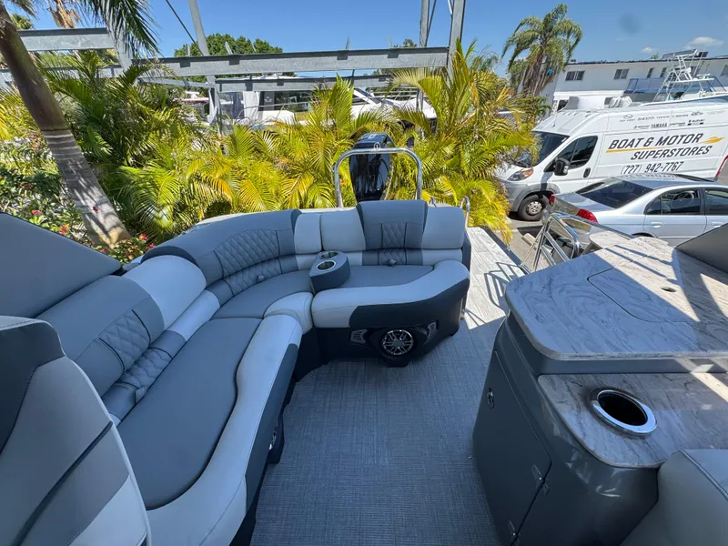 Slide: The Image of Luxurious 2025 Avalon Excalibur 27' boat interior with plush seating and modern amenities. - 40