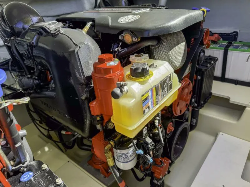 Slide: The Image of Engine compartment of 2022 Chris-Craft Launch 31 GT boat, showcasing detailed mechanical components. - 12