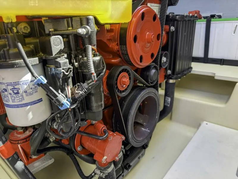 Slide: The Image of Engine of 2022 Chris-Craft Launch 31 GT boat, showcasing detailed mechanical components. - 13