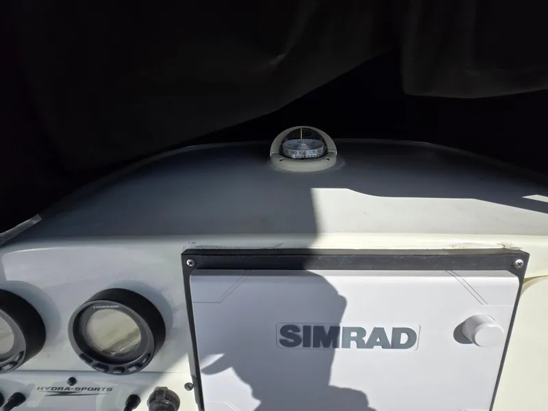 Slide: The Image of 2009 Hydra-Sports Vector 2200 CC dashboard with Simrad navigation system and compass. - 11