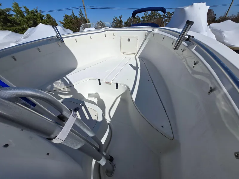 Slide: The Image of 2009 Hydra-Sports Vector 2200 CC boat interior, showcasing spacious deck and seating area. - 12