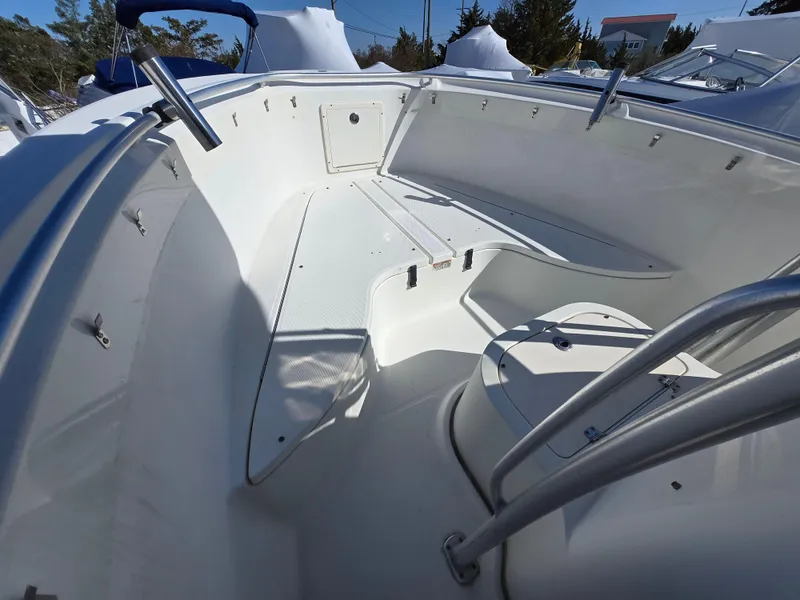Slide: The Image of 2009 Hydra-Sports Vector 2200 CC boat interior with seating and storage compartments. - 6
