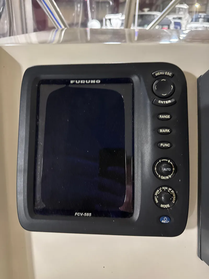 Slide: The Image of Furuno FCV-585 display on 1990 Tiara Yachts 4300 Convertible dashboard. - 16