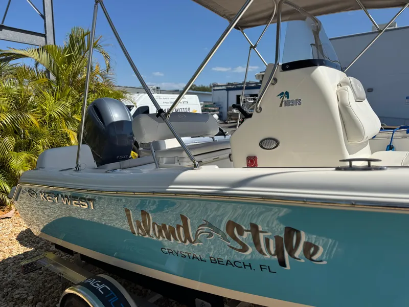 Slide: The Image of 2022 Key West 189 FS boat, "Island Style," Crystal Beach, FL, sunny day, palm trees. - 5
