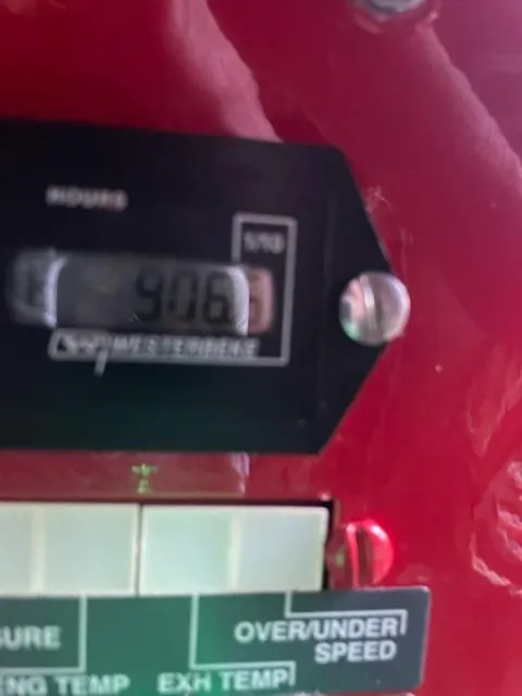 Slide: The Image of Close-up of a Sunstar 16x58 control panel displaying 906 hours, 2016 model. - 48