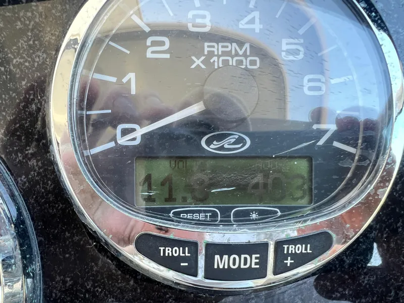 Slide: The Image of Close-up of a 2006 Sea Ray 290 Sundancer RPM gauge displaying 4.3. - 33
