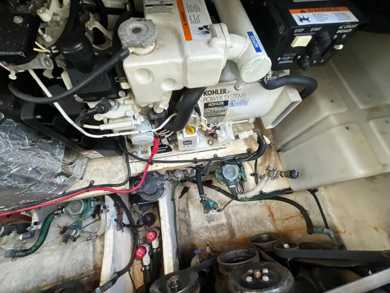 Slide: The Image of Engine compartment of a 2006 Sea Ray 290 Sundancer with Kohler power system. - 38