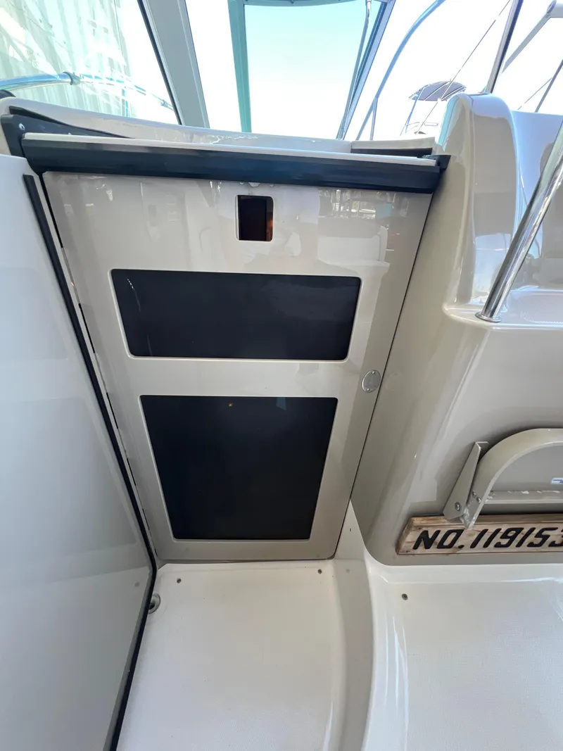 Slide: The Image of 2006 Sea Ray 290 Sundancer interior detail with sleek design and modern features. - 40