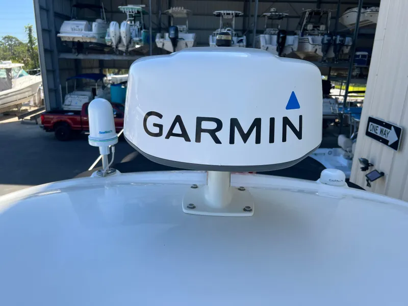 Slide: The Image of Garmin radar on 2006 Sea Ray 290 Sundancer boat, docked in a marina. - 42