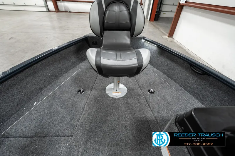 Slide: The Image of 2025 Lund 1675 Adventure SS boat interior with swivel seat in showroom. - 18