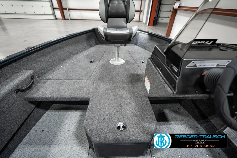 Slide: The Image of 2025 Lund 1675 Adventure SS boat interior with seating and control panel. - 24