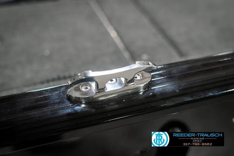 Slide: The Image of 2025 Lund 1675 Adventure SS boat cleat on deck, Reeder-Trausch Marine logo visible. - 45