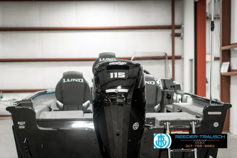 Slide: The Image of 2025 Lund 1675 Adventure SS boat with Mercury 115 engine in showroom. - 5