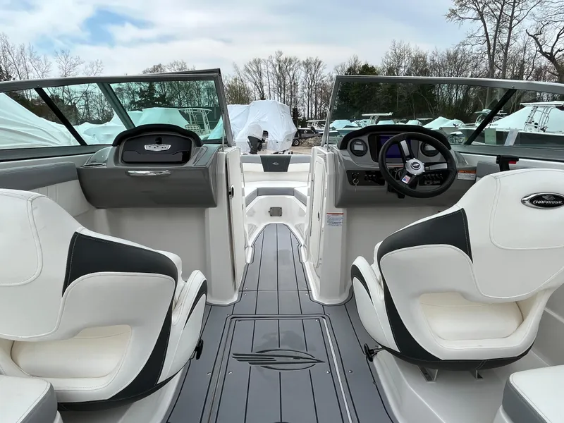 Slide: The Image of 2023 Chaparral 23 SSIOB boat interior with modern seating and dashboard. - 14
