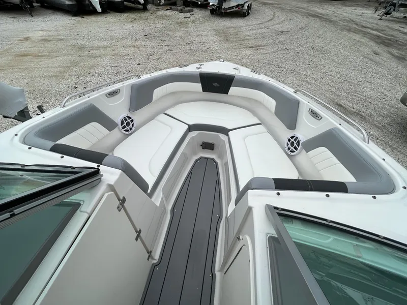 Slide: The Image of 2023 Chaparral 23 SSIOB boat interior with spacious seating and modern design. - 17