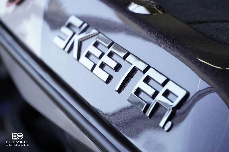 Slide: The Image of 2025 Skeeter ZXR 20 SE logo on sleek metallic surface. - 14