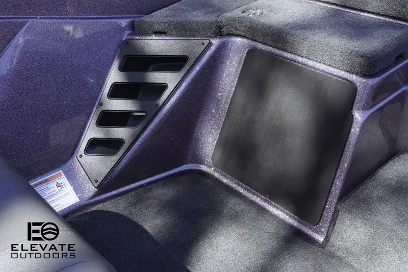 Slide: The Image of 2025 Skeeter ZXR 20 SE boat interior with storage compartments and sleek design. - 8