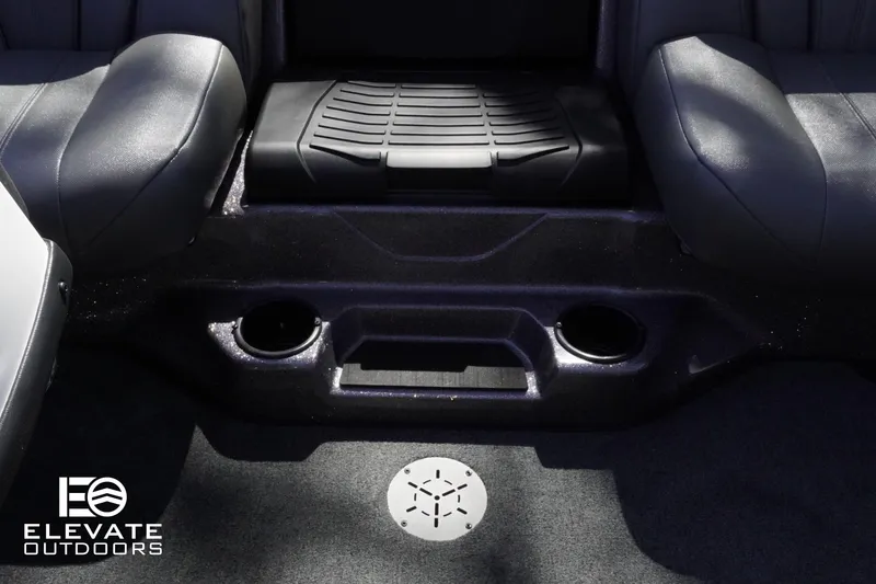 Slide: The Image of 2025 Skeeter ZXR 20 SE boat interior with black seating and cup holders. - 9