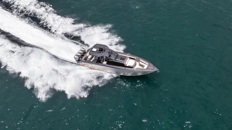 Slide: The Image of 2025 Cigarette 42 Auroris speedboat cruising on open water, creating a dynamic wake. - 16