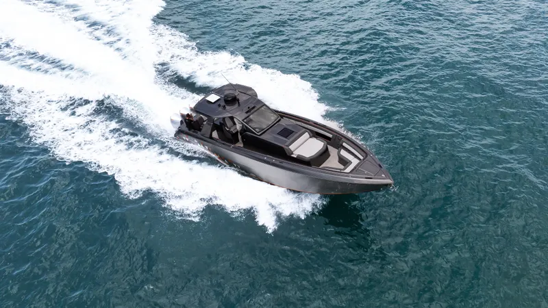 Slide: The Image of 2025 Cigarette 42 Auroris speedboat cruising on open water, showcasing sleek design and performance. - 28