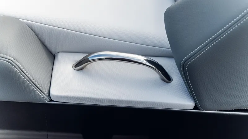 Slide: The Image of Interior detail of 2025 Cigarette 42 Auroris, featuring sleek chrome handle and modern design. - 36