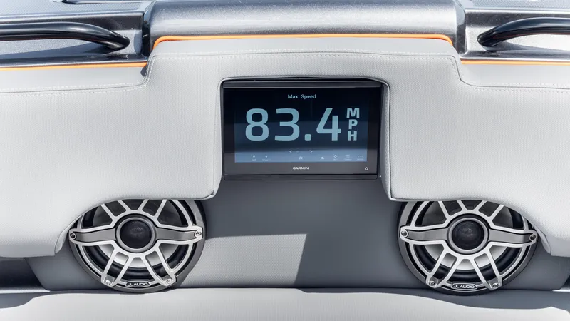 Slide: The Image of Dashboard of 2025 Cigarette 42 Auroris showing 83.4 MPH with speakers. - 40