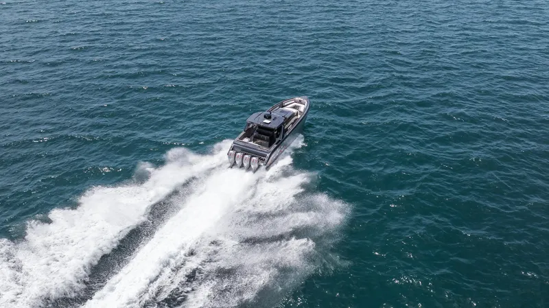 Slide: The Image of Aerial view of 2025 Cigarette 42 Auroris speedboat cruising on open water. - 5