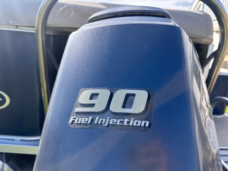 Slide: The Image of 2011 Avalon Windjammer 24' boat engine with 90 fuel injection. - 11