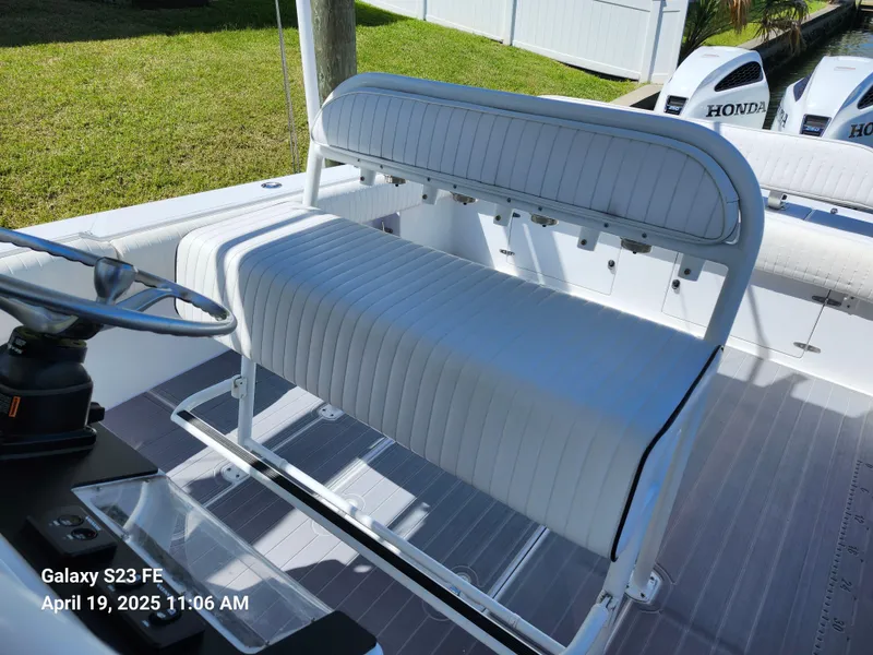 Slide: The Image of White seating on 2001 Jupiter 31 Open Center Console boat, with Honda engines visible. - 29
