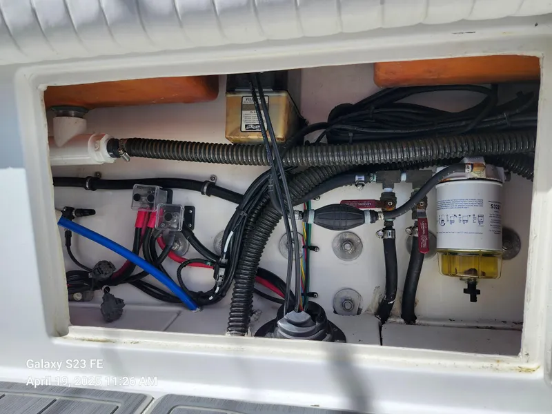 Slide: The Image of 2001 Jupiter 31 Open Center Console wiring and components inside compartment. - 40