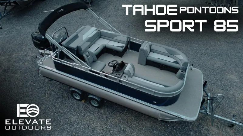 Slide: The Image of 2025 Tahoe Pontoon Sport 85 Cruise boat on trailer, featuring spacious seating and sleek design. - 0