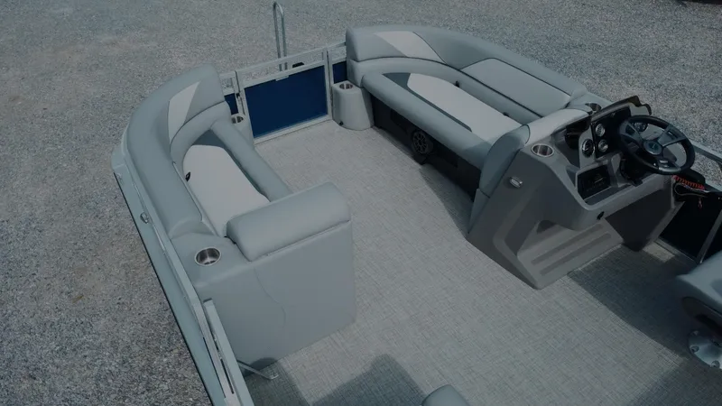 Slide: The Image of 2025 Tahoe Pontoon Sport 85 Cruise interior with spacious seating and modern helm. - 17