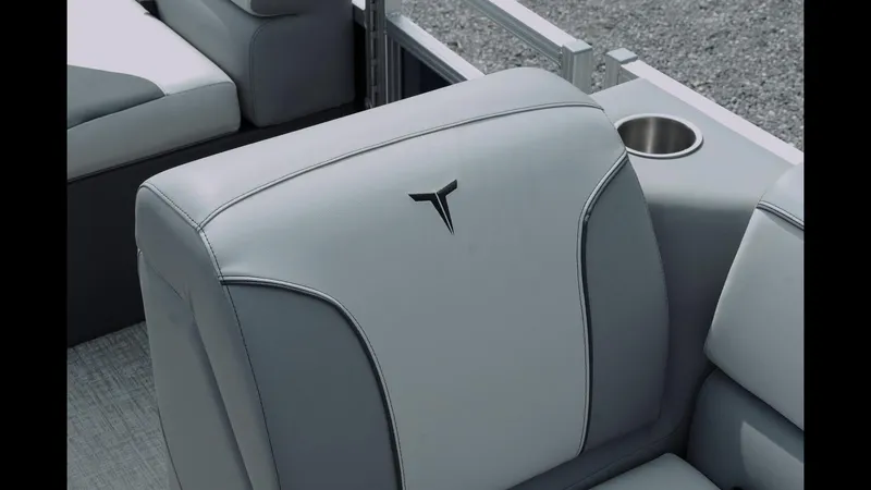 Slide: The Image of 2025 Tahoe Pontoon Sport 85 Cruise seat with logo and cup holder. - 19