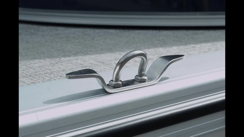 Slide: The Image of Stainless steel cleat on 2025 Tahoe Pontoon Sport 85 Cruise boat deck. - 29