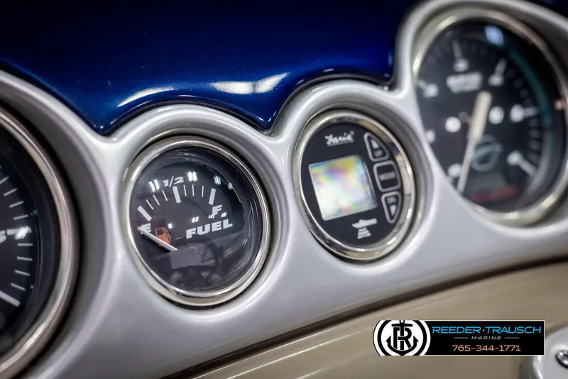 Slide: The Image of Dashboard of a 2006 Crownline 230 LS boat with fuel gauge and controls. - 30