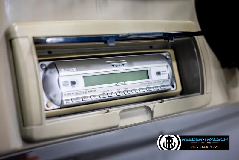 Slide: The Image of Sony stereo system in a 2006 Crownline 230 LS boat dashboard. - 34