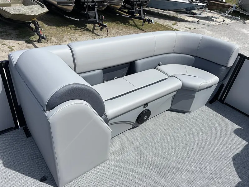 Slide: The Image of 2025 Bentley Pontoons Legacy QSB interior with luxurious gray seating. - 11