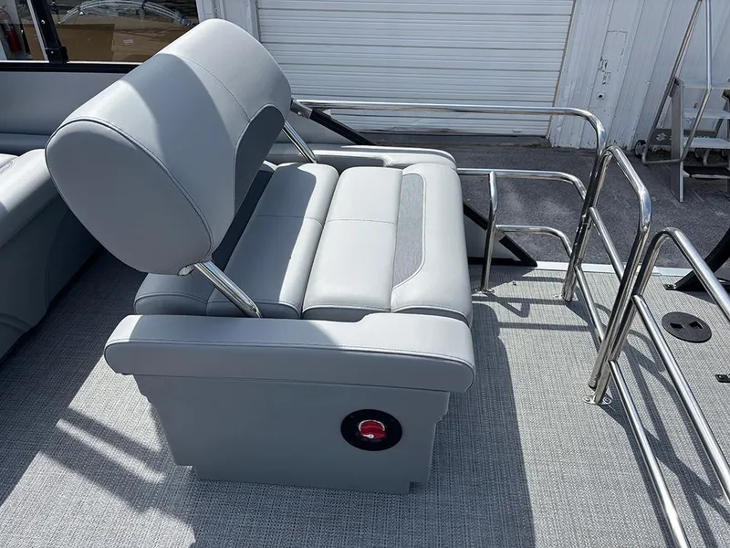 Slide: The Image of 2025 Bentley Pontoons Legacy QSB, featuring luxurious gray seating and sleek design. - 21