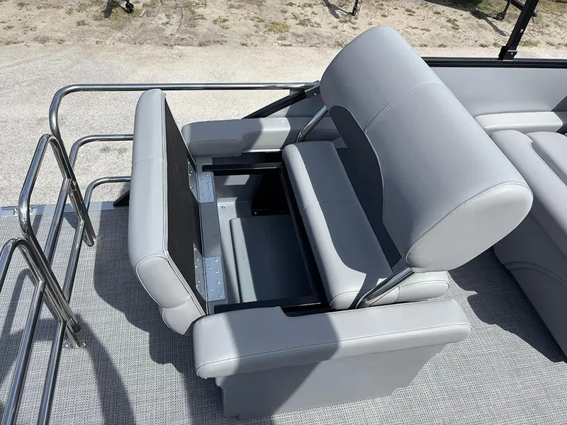 Slide: The Image of 2025 Bentley Pontoons Legacy QSB with luxurious gray seating and sleek design. - 24