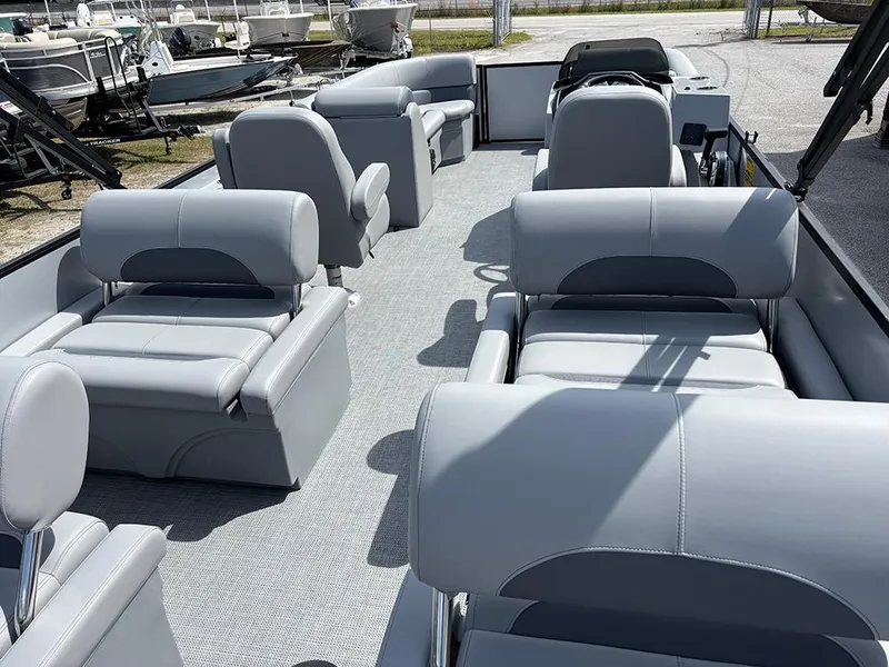 Slide: The Image of 2025 Bentley Pontoons Legacy QSB with luxurious seating and spacious deck layout. - 9