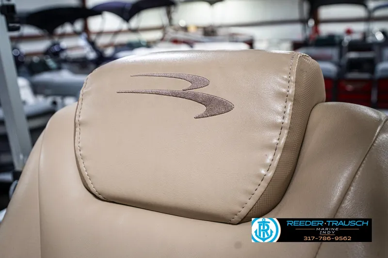 Slide: The Image of Beige leather seat with embroidered logo on a 2018 Bennington 20 SLMX boat. - 42