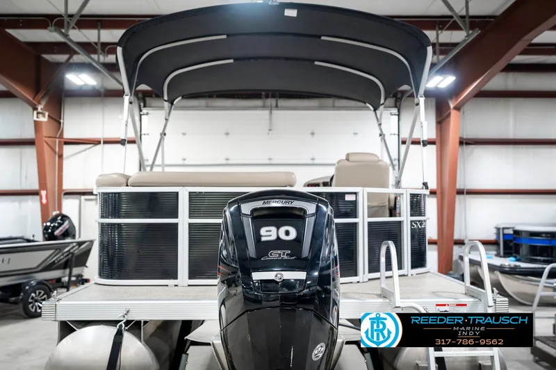 Slide: The Image of 2018 Bennington 20 SLMX pontoon boat with 90 HP engine in showroom. - 9