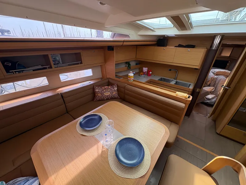 Slide: The Image of Luxurious interior of 2018 Dufour 560 Exclusive yacht with elegant dining area and modern kitchen. - 37
