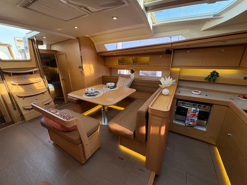 Slide: The Image of Luxurious interior of 2018 Dufour 560 Exclusive yacht with modern kitchen and dining area. - 39