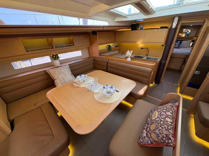 Slide: The Image of Luxurious interior of 2018 Dufour 560 Exclusive yacht with elegant seating and modern kitchen. - 45