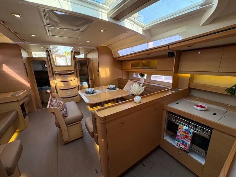 Slide: The Image of Luxurious interior of 2018 Dufour 560 Exclusive yacht with modern kitchen and dining area. - 48